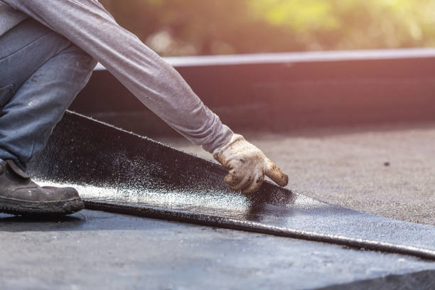 Professional Basement Waterproofing technician working in Rainbow City, AL